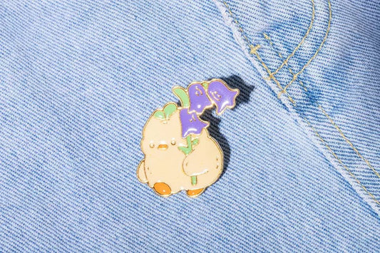 pins canard fleurs cdb