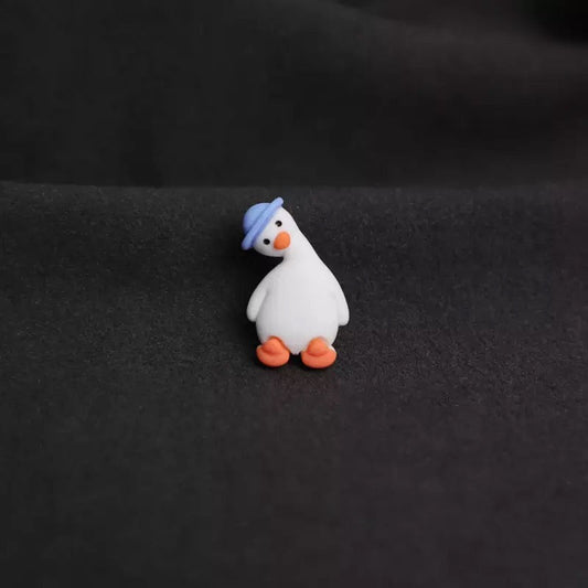 pins canard blanc chapeau bleu cdb