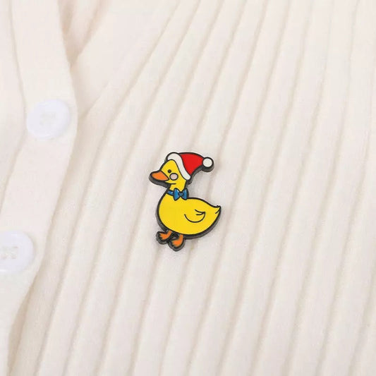 pins canard bonnet de noel cdb