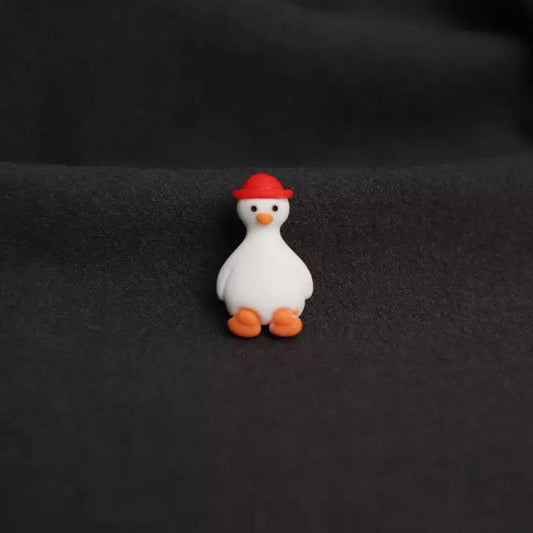 pins canard blanc chapeau rouge cdb