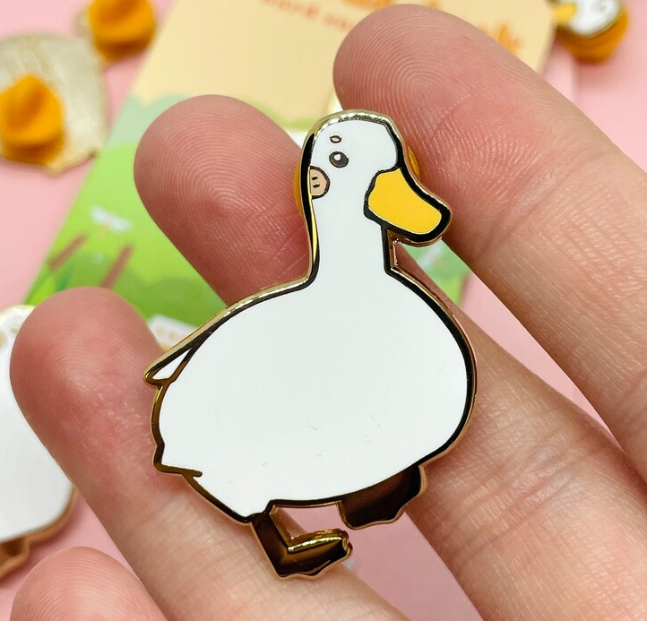 Pin's Canard Curieux