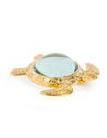 Brass magnifying glass in the shape of a turtle