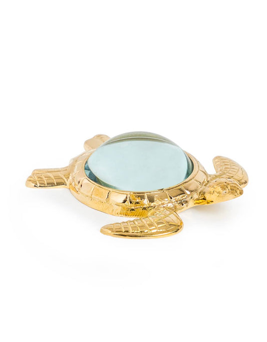 Brass magnifying glass in the shape of a turtle