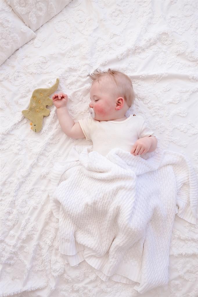 jouet a froisser doudou dinausore triceratops tikiri 