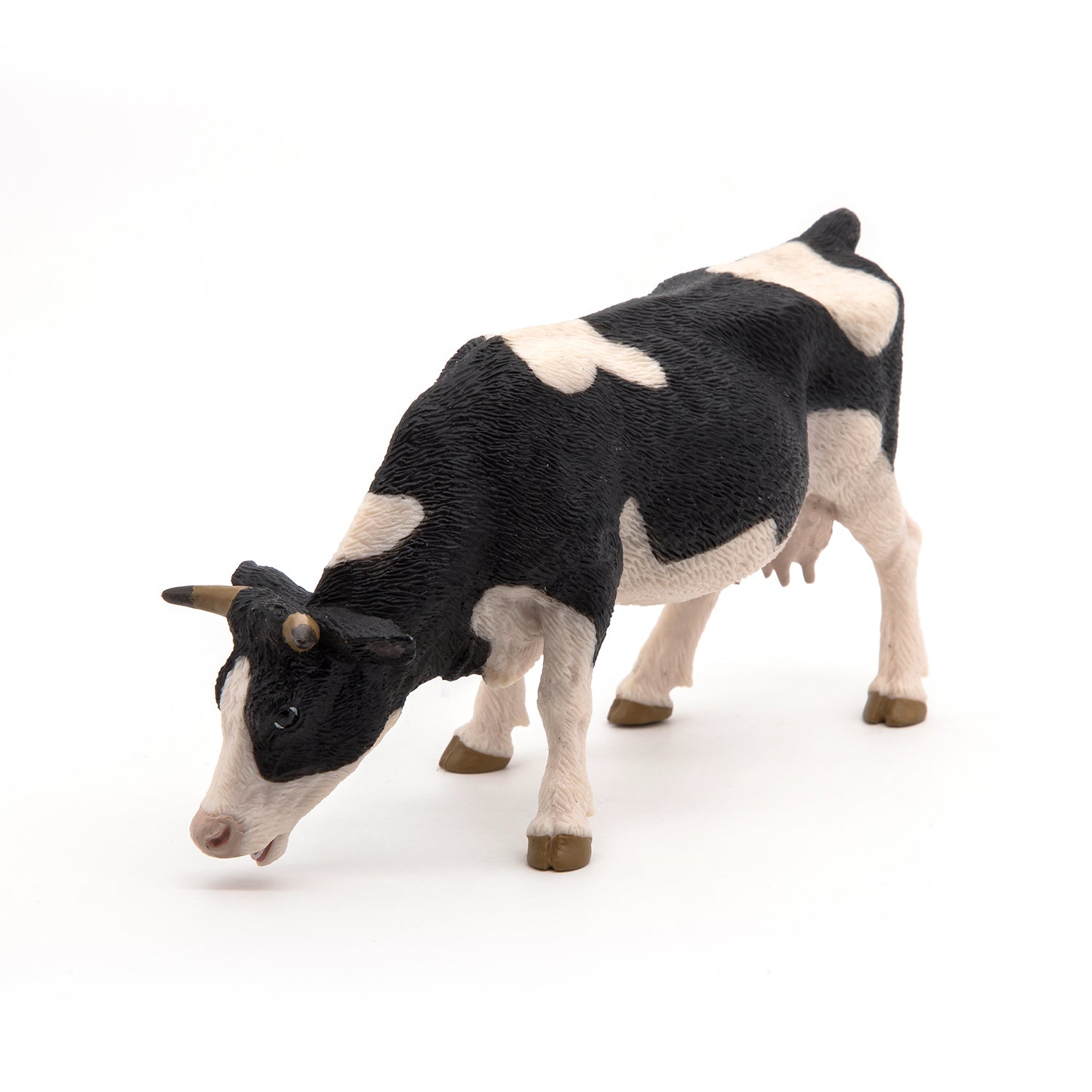 Figurine Vache noire et blanche broutant Papo - animal de la ferme