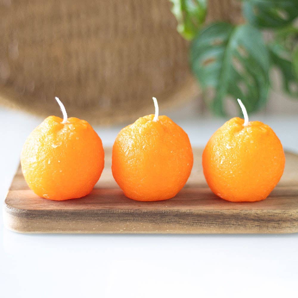Set of 3 orange-shaped candles