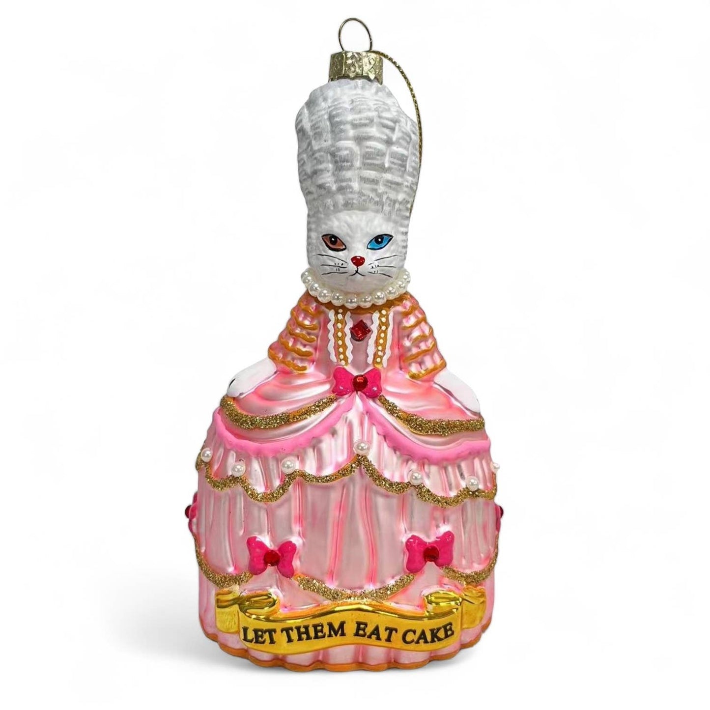 Christmas bauble featuring a white cat named Marie Antoinette, “Let Them Eat”