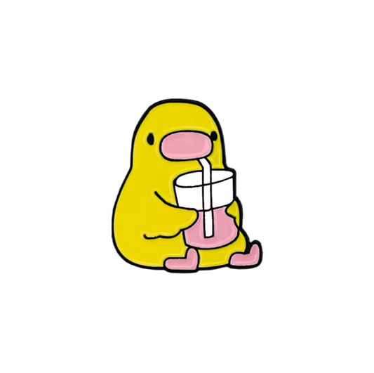 pins canard jaune avec sa boisson