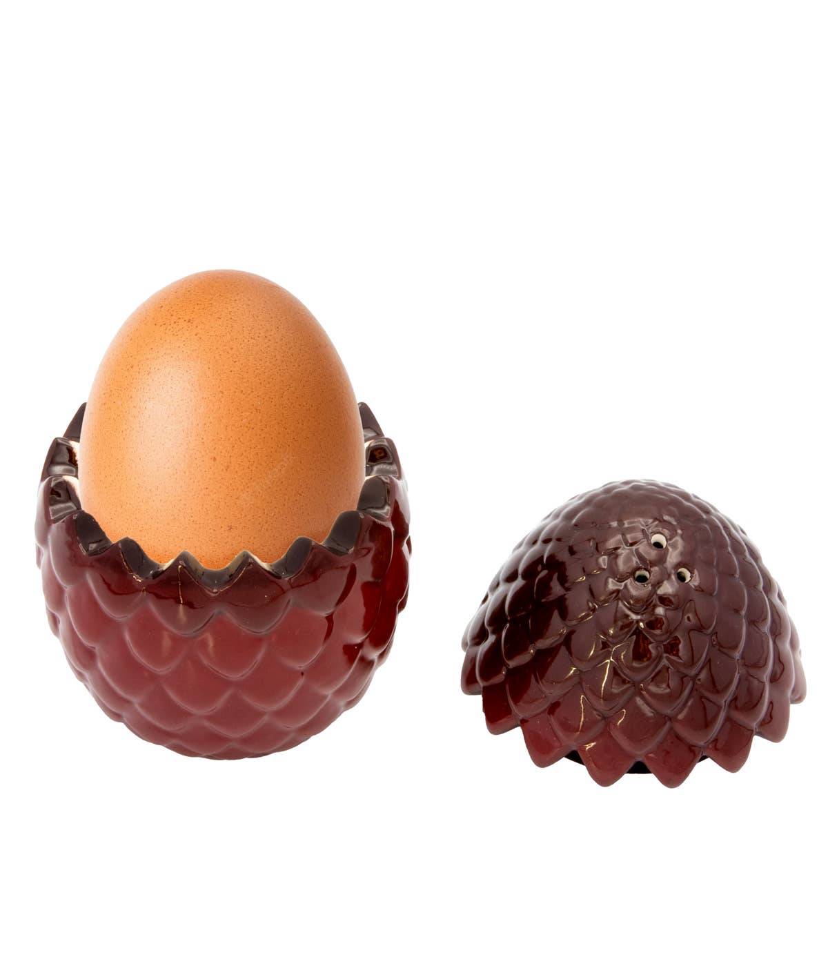 Coquetier Game of Thrones en céramique en forme d’œuf de dragon rouge avec couvercle écaillé.