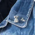 Pin's Koala et Bébé Meta[l]morphose – vue principale