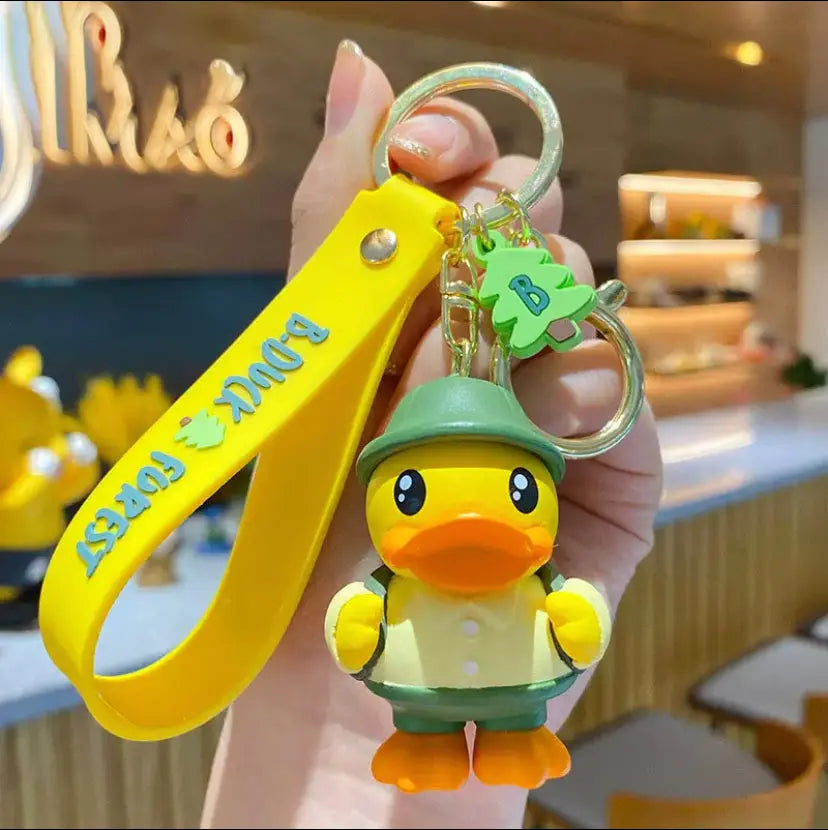 porte cles canard jaune campeur 